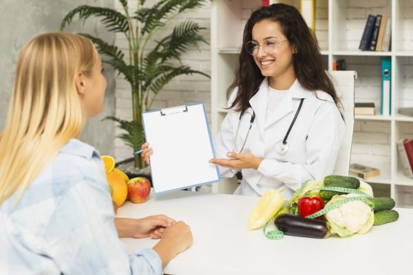 medium-shot-doctor-showing-results-patient